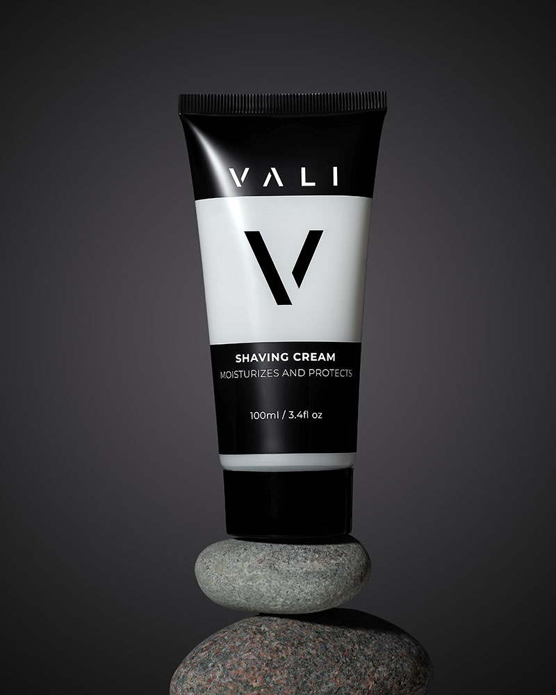 vali shaving cream on a dark background