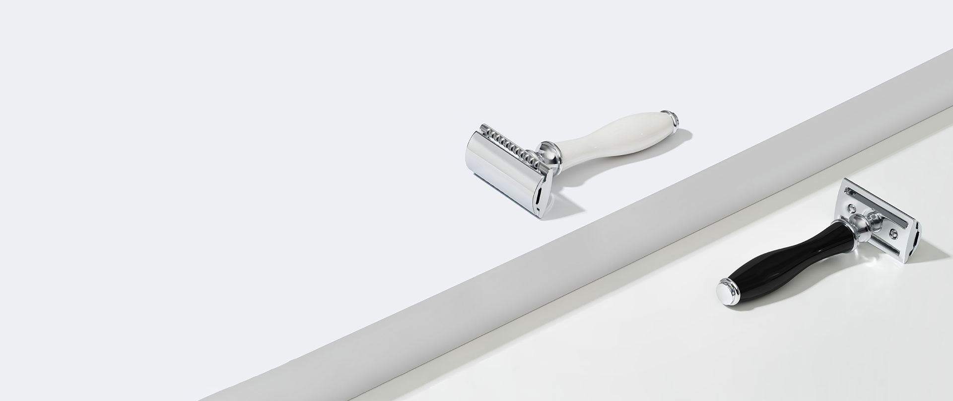 Two safety razors from Vali. White and black.